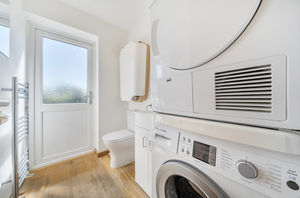 Utility and wc- click for photo gallery